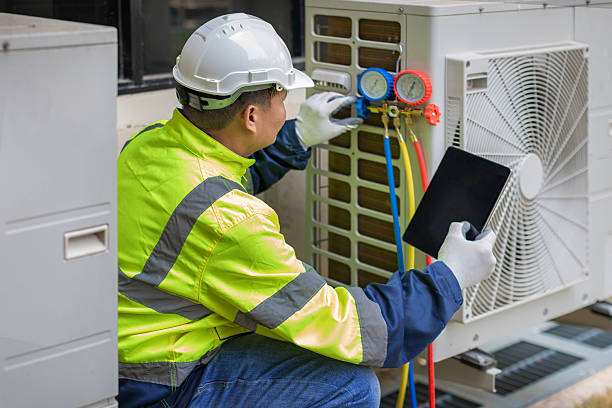 Professional Heat Pump Repair technician working in Bogart, GA